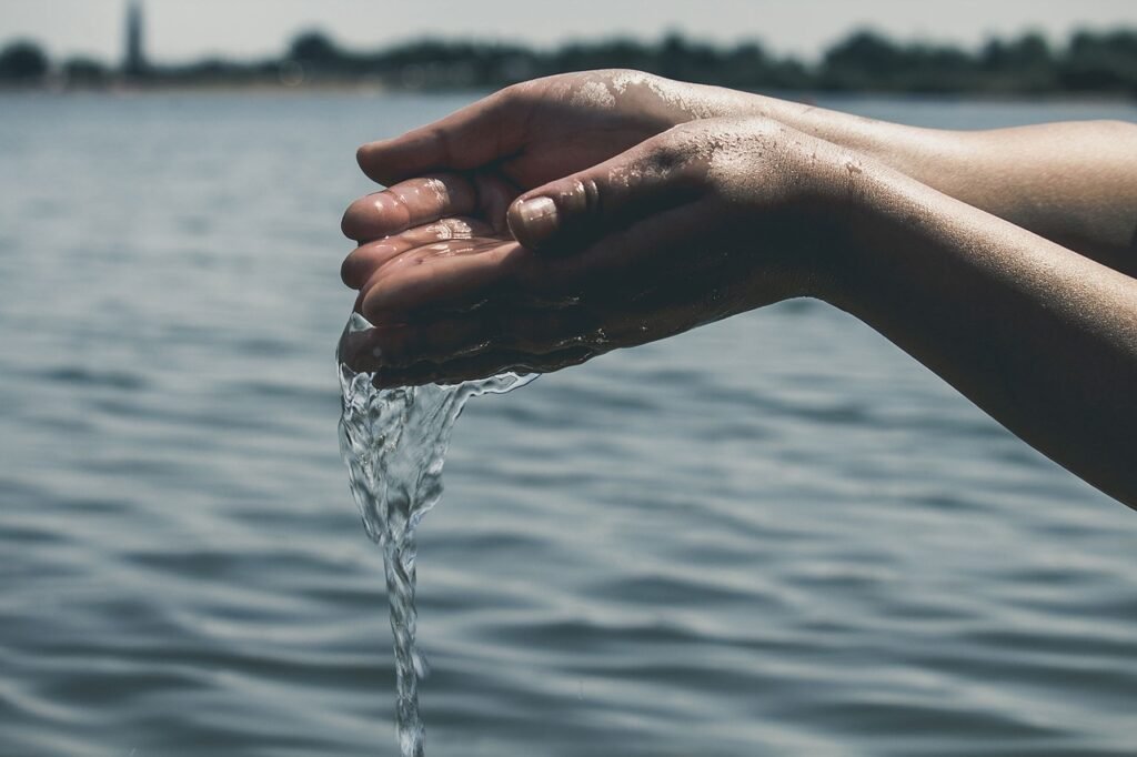 hands, water, nature-2619474.jpg